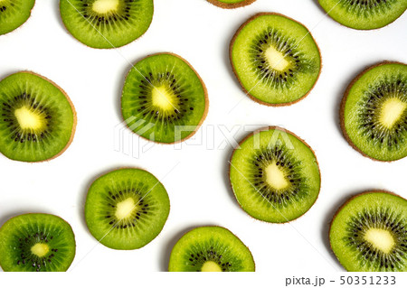 Sliced kiwi fruit on white background pattern Sliced kiwi fruit on white background pattern 50351233