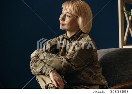 Portrait of young female soldier 50358693