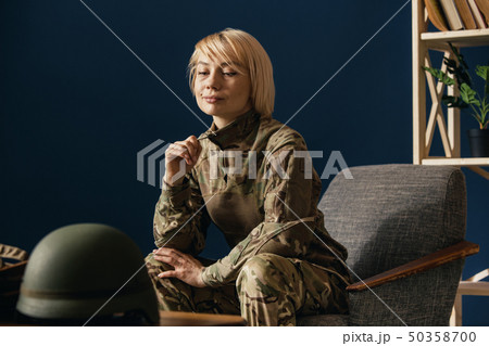 Portrait of young female soldier 50358700