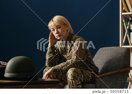Portrait of young female soldier 50358715
