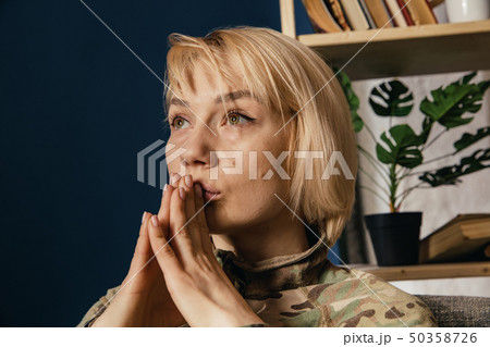 Portrait of young female soldier 50358726