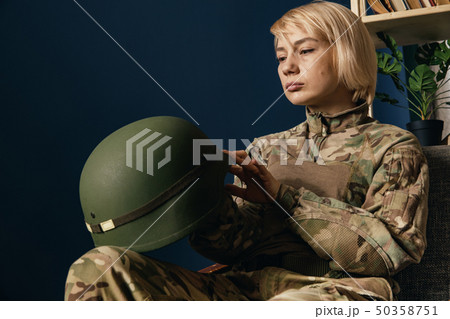 Portrait of young female soldier Portrait of young female soldier 50358751