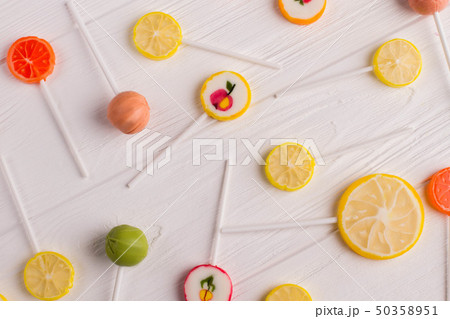 Background of colorful assorted lollipop candies. Background of colorful assorted lollipop candies. 50358951
