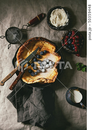 Dutch baby with berries Dutch baby with berries 50359448