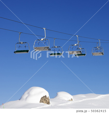Chair-lift at ski resort at sun day after snowfall 50362415