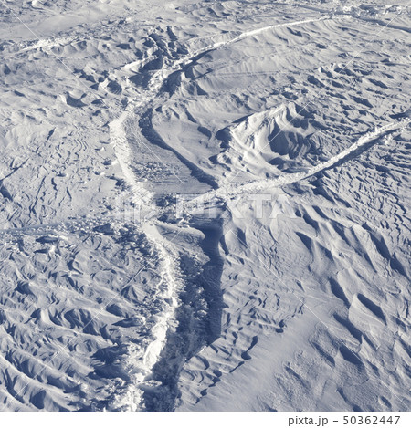 Off-piste slope after snowfall at sun morning 50362447