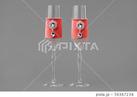 Luxury wedding wine glasses decorated with velvet. Luxury wedding wine glasses decorated with velvet. 50367238