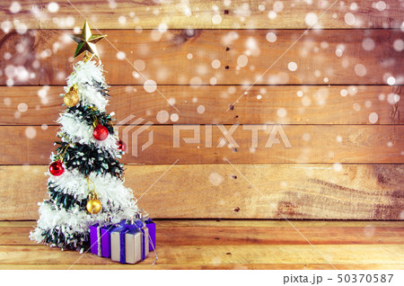 Christmas tree with many presents under it 50370587