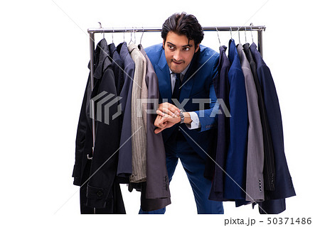 Young handsome businessman in clothing concept Young handsome businessman in clothing concept 50371486