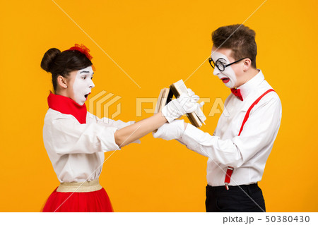 portrait of mime couple artist with book 50380430