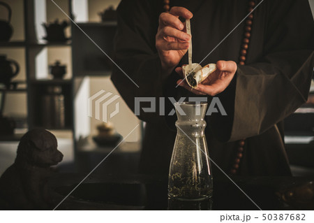 Tea ceremony is perfomed by tea master Tea ceremony is perfomed by tea master 50387682