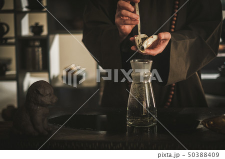 Tea ceremony is perfomed by tea master Tea ceremony is perfomed by tea master 50388409