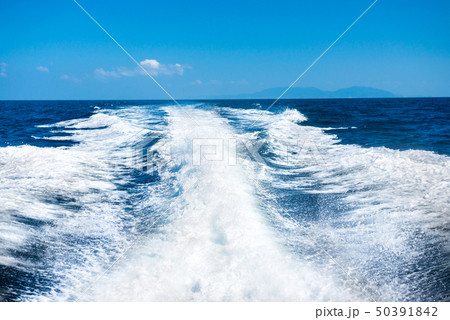 Wake of boat on water surface 50391842