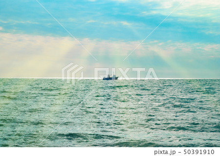 Ship against sea sunset. 50391910