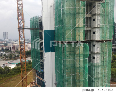 Safety netting installed at the high rise building 50392508