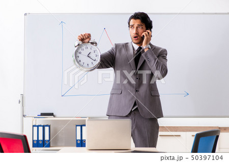 Young handsome businessman in front of whiteboard  50397104