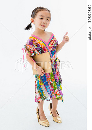 Little girl playing 50399369