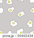 Seamless pattern of fried eggs on beige background 50402438