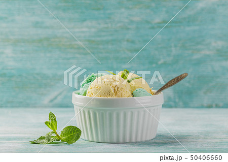 Ice cream with mint in ceramic bowl 50406660