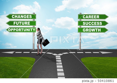 Businesswoman having hard choice standing at crossroads Businesswoman having hard choice standing at crossroads 50410861