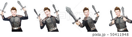 Young funny man in armour suit  50411948