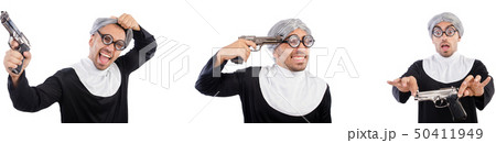 Man in nun dress with handgun Man in nun dress with handgun 50411949