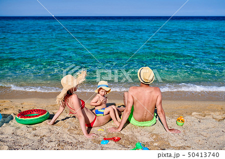 Family on beach in Greece 50413740