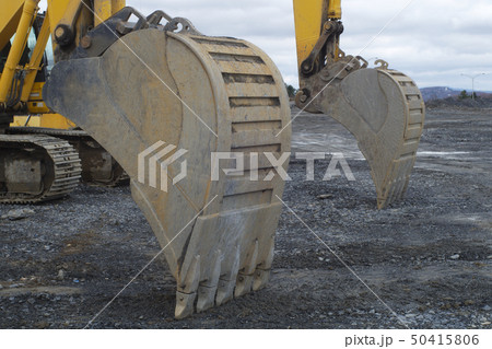 construction site yellow excavator hydrolic dig 50415806