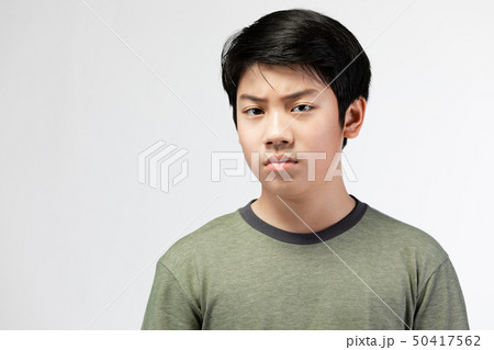 Bad temper emotional portrait of asian teen boy Bad temper emotional portrait of asian teen boy 50417562