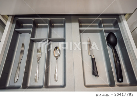 Minimalist kitchen. Only the most necessary. Spoon, fork, knife 50417795