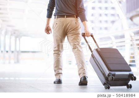 businessman walking outside public transport businessman walking outside public transport 50418984