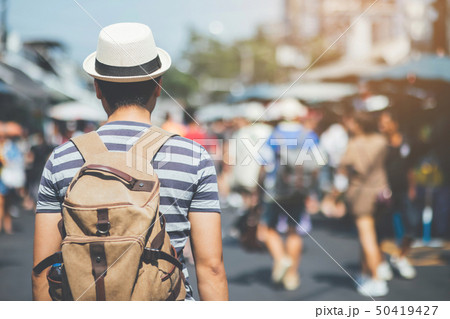 Young asian man traveler traveling backpacker Young asian man traveler traveling backpacker 50419427