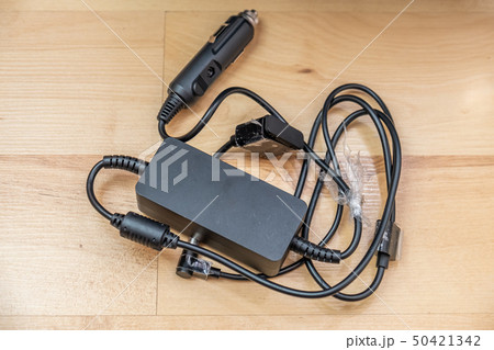 Car power adapter for electronic devices and batteries Car power adapter for electronic devices and batteries 50421342