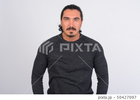 Portrait of handsome man with mustache looking at camera Portrait of handsome man with mustache looking at camera 50427097