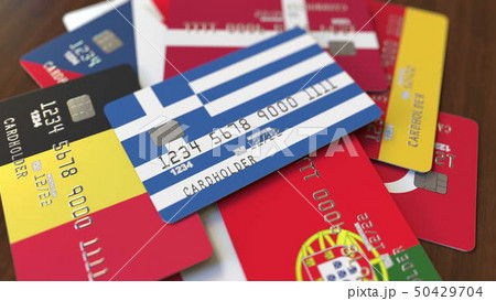 Many credit cards with different flags, emphasized bank card with flag of Greece. 3D rendering 50429704