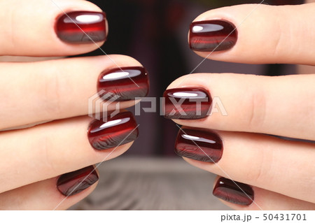 glamorous beautiful manicure on a trendy texture background glamorous beautiful manicure on a trendy texture background 50431701