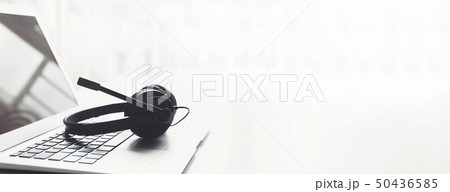 Headset, hotline support concept in office Headset, hotline support concept in office 50436585