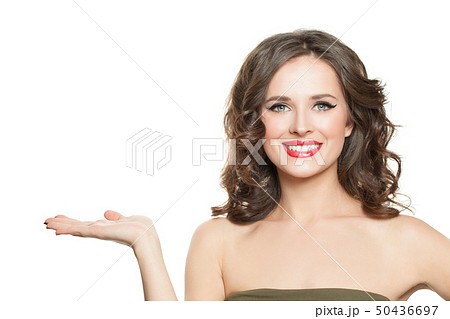 Smiling woman with empty open hand isolated Smiling woman with empty open hand isolated 50436697