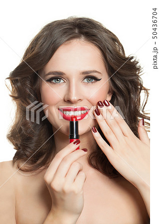 Happy woman with red manicured nails, lipstick Happy woman with red manicured nails, lipstick 50436704