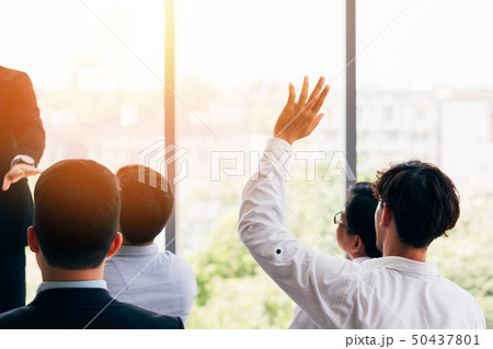 Man having question during seminar Man having question during seminar 50437801