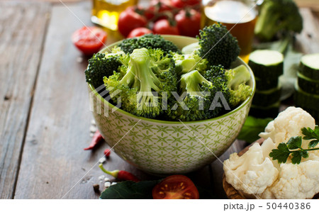 Fresh green broccoli and vegetables Fresh green broccoli and vegetables 50440386