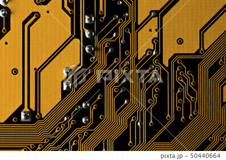 Macro picture of yellow printed circuit board - PCB texture 50440664