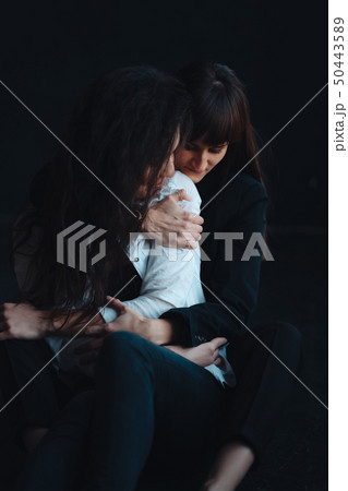 Two girls in each other's tender embraces 50443589