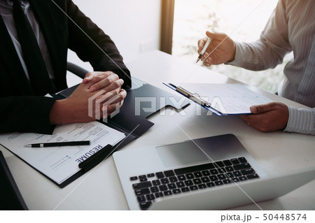 Men are describing the employment history of the Men are describing the employment history of the 50448574