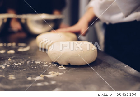 Woman preparing yeast dough 50455104