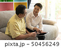 Portrait of happy old loving couple smiling 50456249