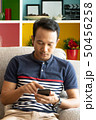 asia man user interact application smartphone on 50456258
