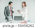 Business people having fun and talking at 50456262