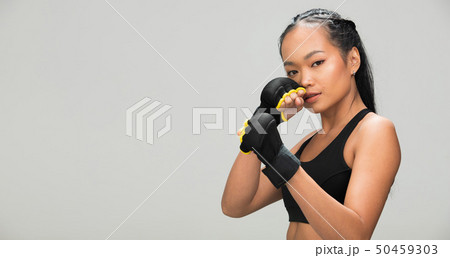 Fitness woman exercise boxing weight punch Fitness woman exercise boxing weight punch 50459303
