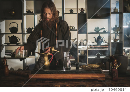 Tea ceremony is perfomed by tea master 50460014